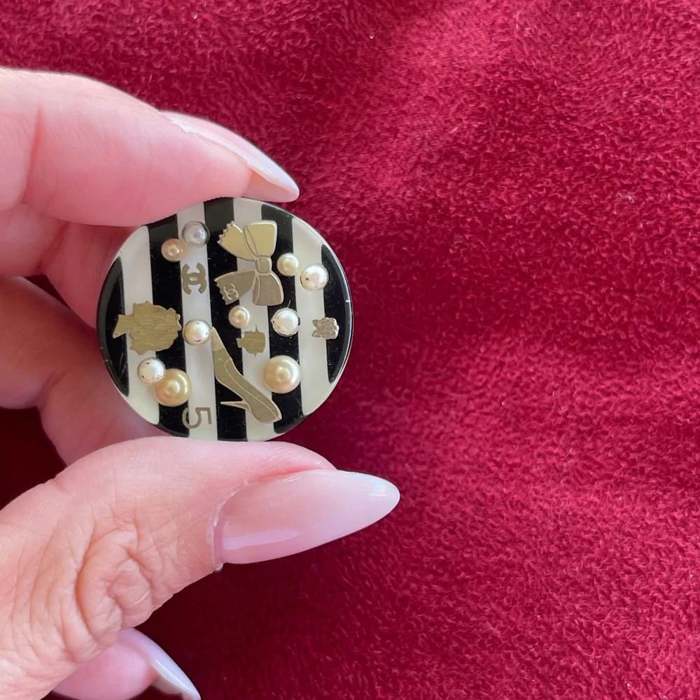 CHANEL Black Resin Ring with Cream Pearl Accents